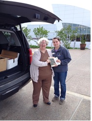 Linda Higgins (L), Jade Walsh, coordinator of donations. Discovery Park of America